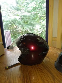 Burgundy motorcycle helmet