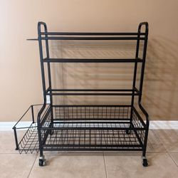 Sturdy rolling gear storage stand