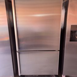 Amana Stainless Steel Refrigerator And Freezer