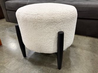 Modern Round Cream Boucle Ottoman with Black Tapered Legs