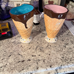 These collectible items are Pier 1 Imports ceramic waffle cone sundae dishes, which are designed to look like ice cream cones dipped in chocolate.