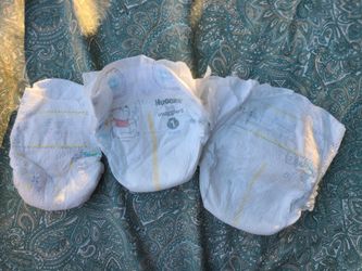Size Nb, 1, and 2 Diapers 