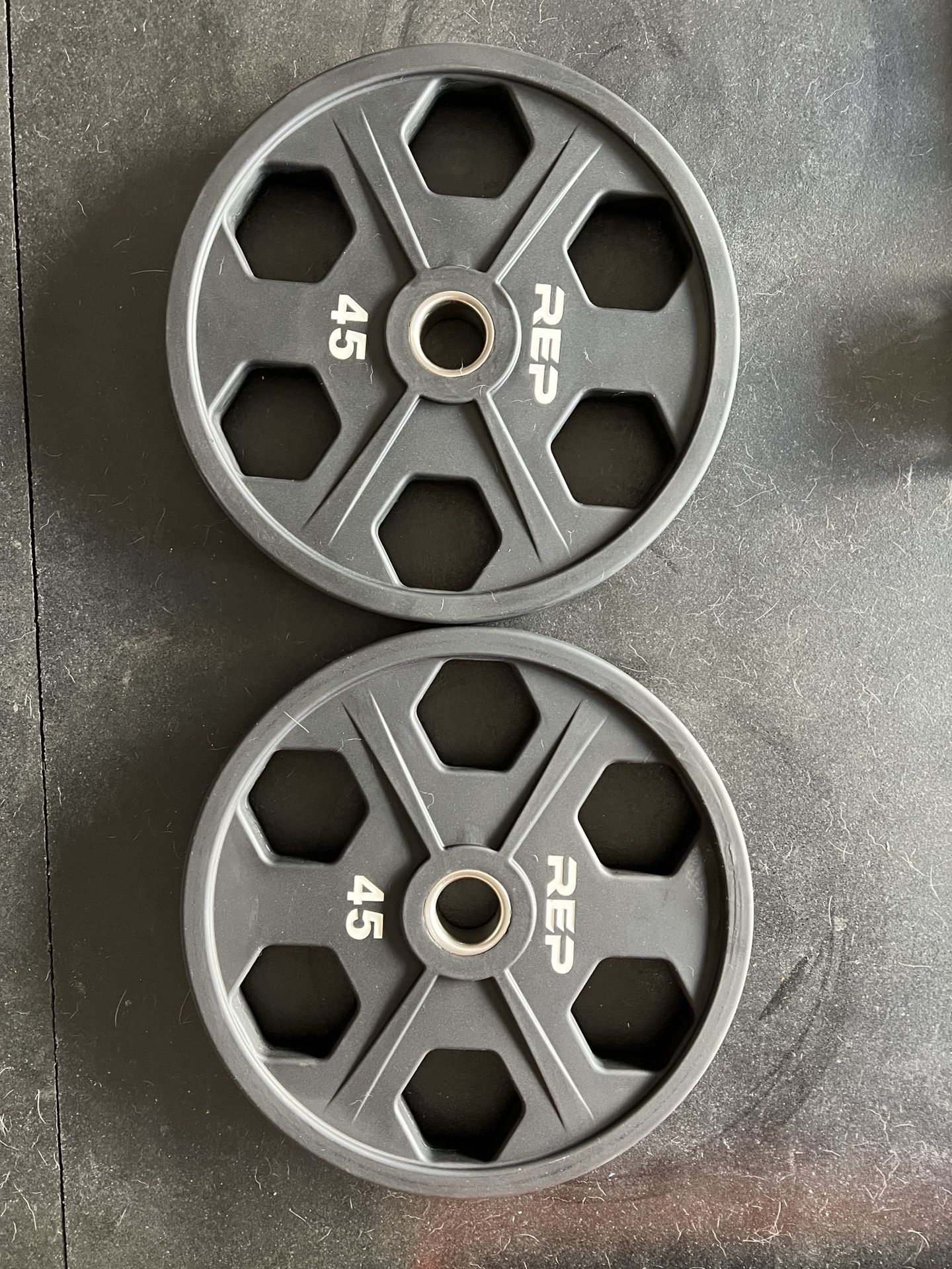 Barely Used Rep Fitness Urethane Coated Equalizer Olympic Plates - 45lb (pair)