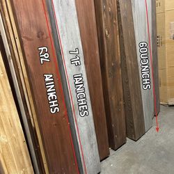 Custom-built raised beds crafted from natural timber. Featuring a dual-size layout with 60" x 10" and 72" x 10" frames to perfectly hug the walkway. N