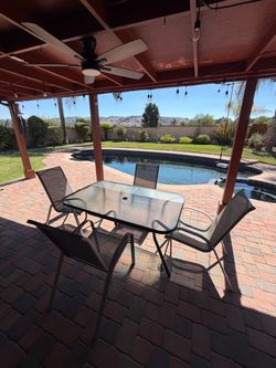 Outdoor Patio Dining Set with Table, 4 Chairs, and Brand New Umbrella