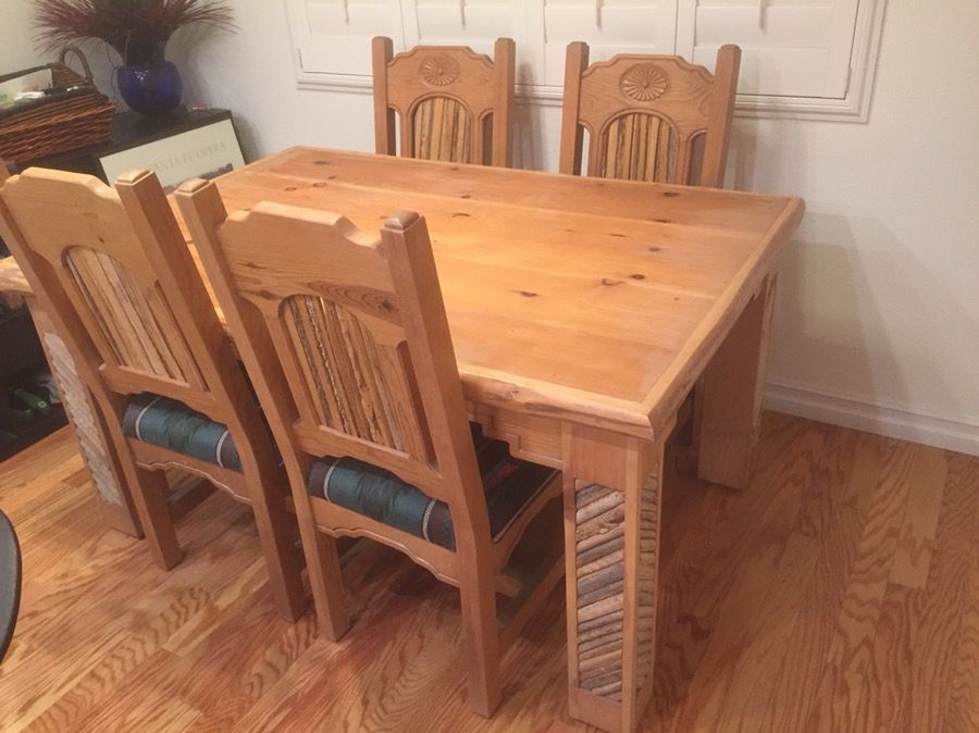 Southwestern dining table and 4 chairs. Real wood with saguaro cactus design.