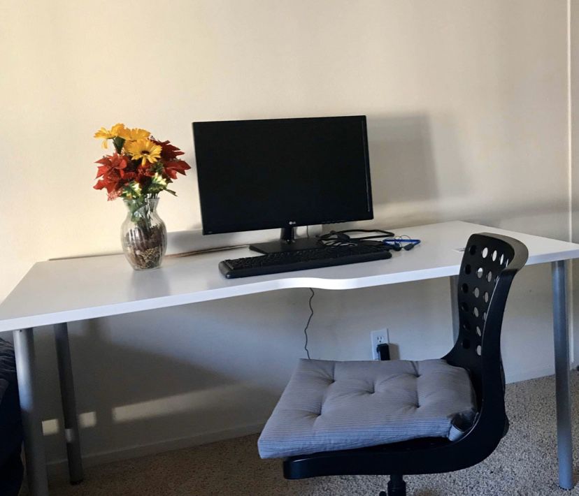 IKEA solid wood desk / table. Chair free .