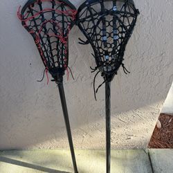 Two Nike Female Lacrosse Sticks 