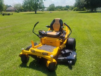 60"Cut Cub cadet XT2 60 inch cut zero turn fabricated deck runs cuts great 2300 cash firm
