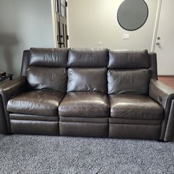 7' Leather Couch With Built In Electric Recliners