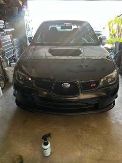 05-07 Sti front and rear bumpers set