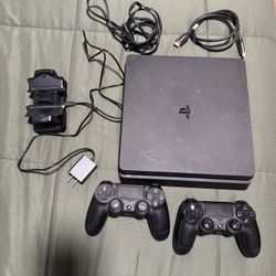 Used PS4 Comes With Two Controllers And Control Chargers 