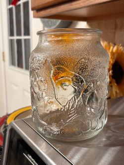 Clear Glass Storage Jar with Embossed Design