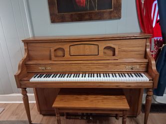 A beautiful Conn upright piano