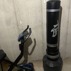 Used exercise bike And Kicking/Punching Bag 
