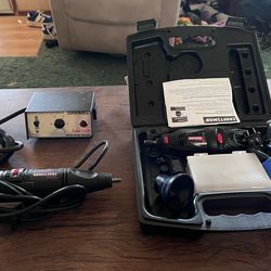 Two Craftsman Dremel Tools, light, depth guide for routing, and accessories.  Also a variable speed control