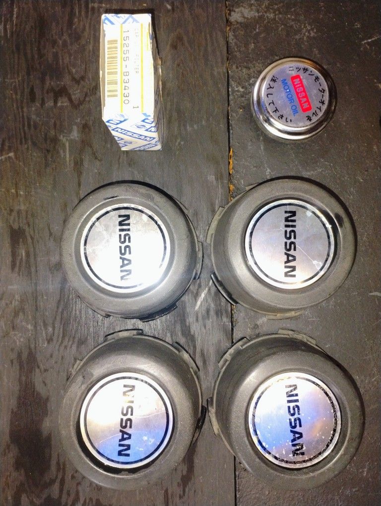 OEM Nissan Center Hub Caps And Oil Filter Cap