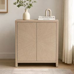 This stylish cabinet combines functionality with timeless design, making it an excellent storage solution while enhancing the look of any room. 