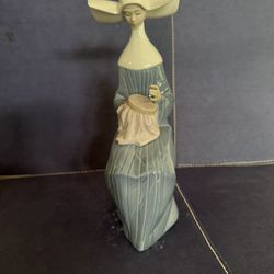 Lladro - Nun Sitting With Needlepoint 
