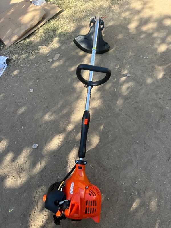 21.2 cc Gas 2-Stroke Curved Shaft String Trimmer with Rapid-Loader Trimmer Head