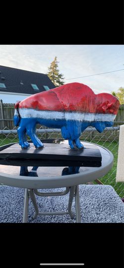 Red, white and blue buffalo statue
