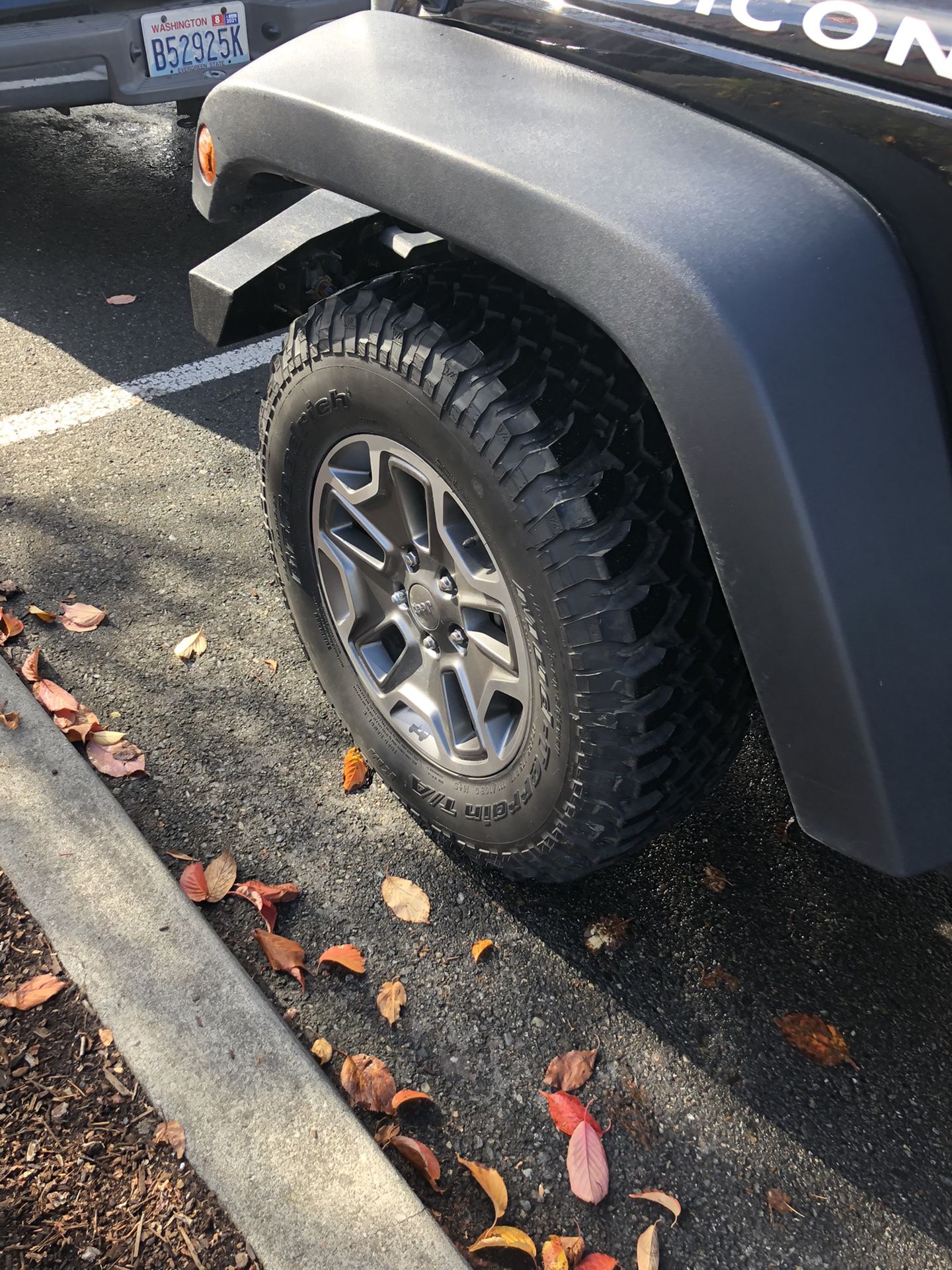 Set of five Jeep wheels. Tires have about 90% tread. Wheels in good shape.