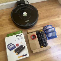 iRobot Roomba vacuum cleaner with extra replacement kit