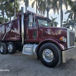 2005 PETERBILT 357 TRI AXLE DUMP TRUCK W/
 STEERABLE THIRD AXLE AXLE 
 FACTORY DOUBLE POWER STEERING
ALL TIRES BRAND NEW 