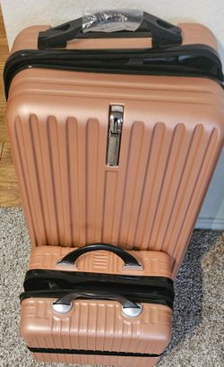 Rose Gold colored carry on 2 piece luggage