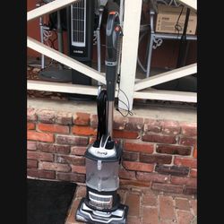 Almost New Shark Vacuum Tested Works Perfectly when you come ill fully test it for you 