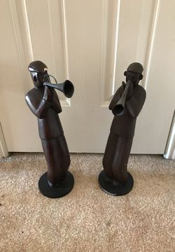 Horn-Playing Statuettes