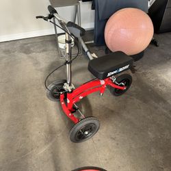 Mobility Scooter Knee Rover With A Metal Basket