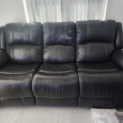 Free Free Black Reclining Sofa  84"long.