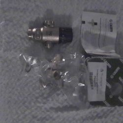 Thermostatic Mixing Valve.  Triangle Tube
