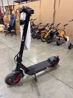Front and rear shock-absorbing electric scooters