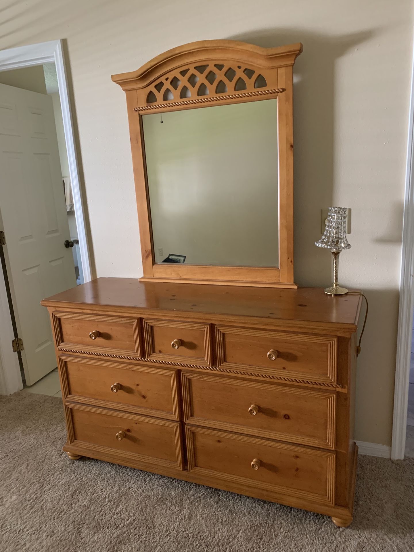 Dresser with mirror , desk and chair