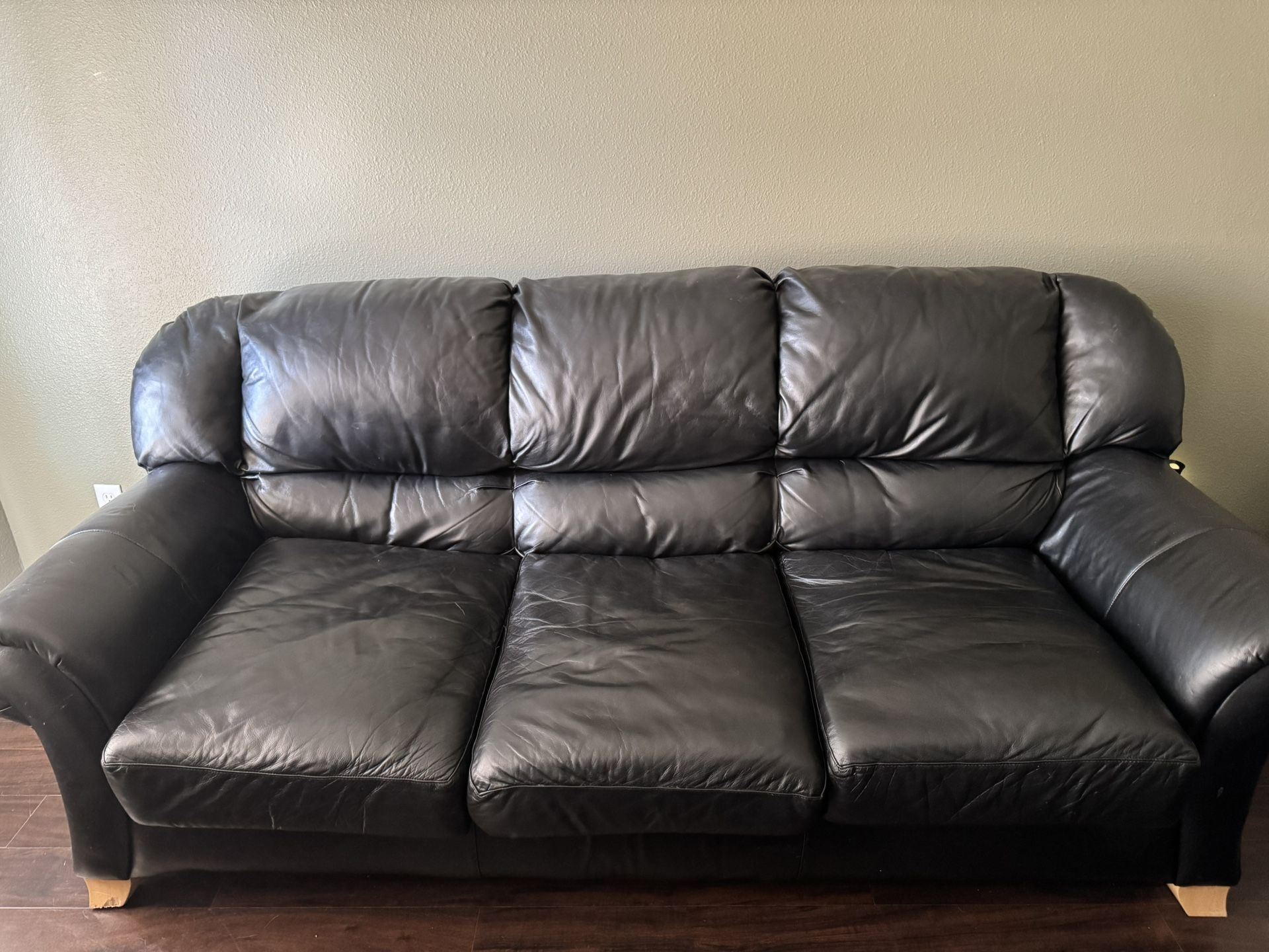 Leather couch with ottoman 