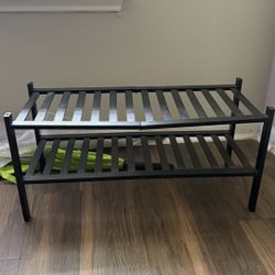 Black shoe rack. 