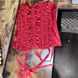 red corset and underwear from Frederick’s