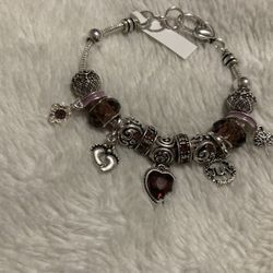 June Charm bracelet- Never Worn
