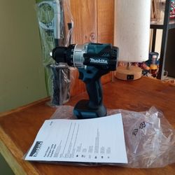 Makita. 18v. New. BL. Hammer Drill.  1/2".   W/ Handle 