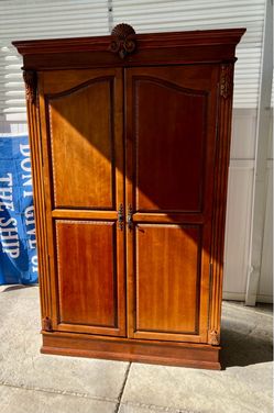Used wood armoire