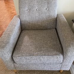2 small gray arm chairs