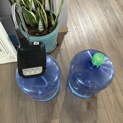 2 -Water Jugs (5 gallons) With Electric fountain