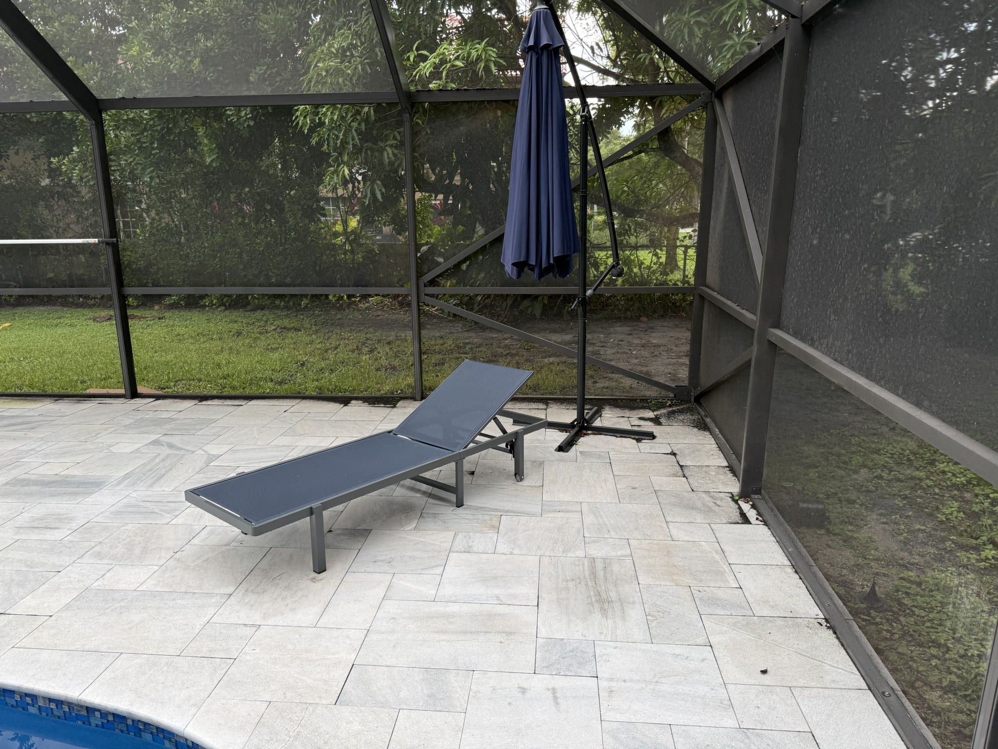 Umbrella And Pool Loungers