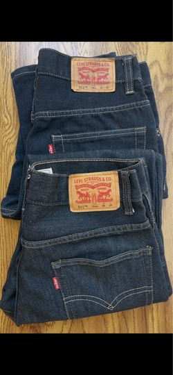 Pairs of Levi’s 511 slim fit jeans / Youth.