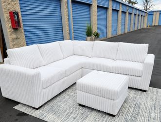 Brand new milk color fur like corduroy Sectional Sofa with ottoman and 2 accent pillows.