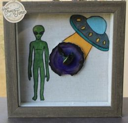 Taxidermy framed alien abduction