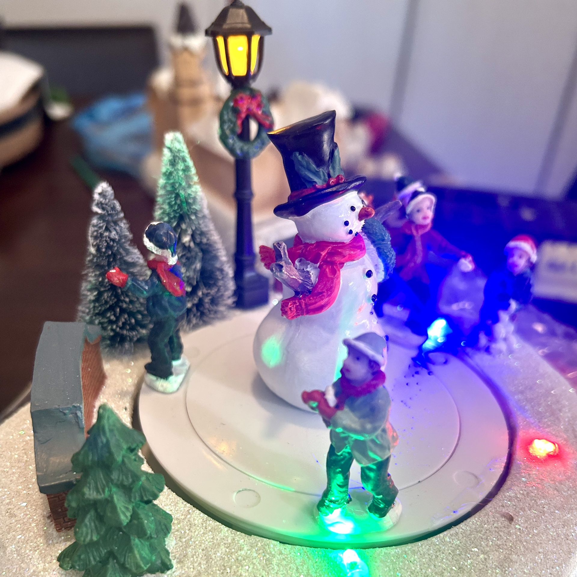 (New) Christmas Snowman Ice Skating Electric Musical-Rotating- Lighted Figurine includes Batteries