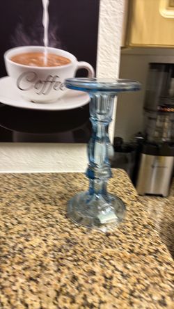 Blue glass candle stick holder